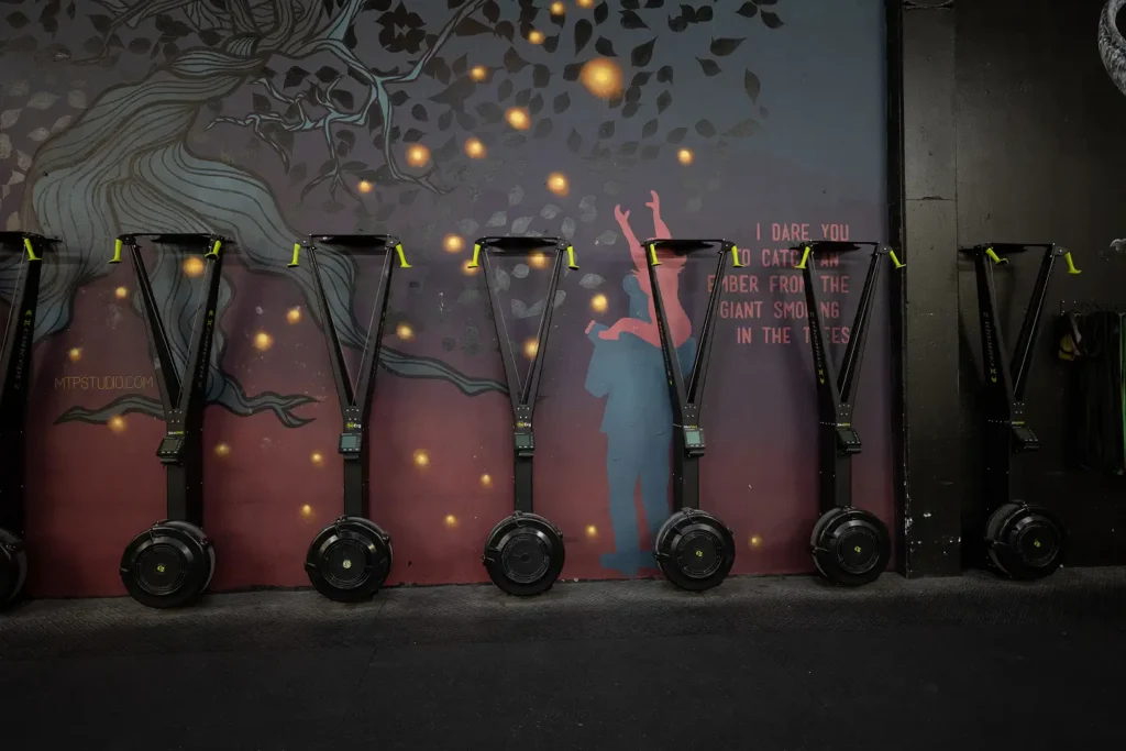 Rowing machines lined up inside ESTLR CrossFit gym